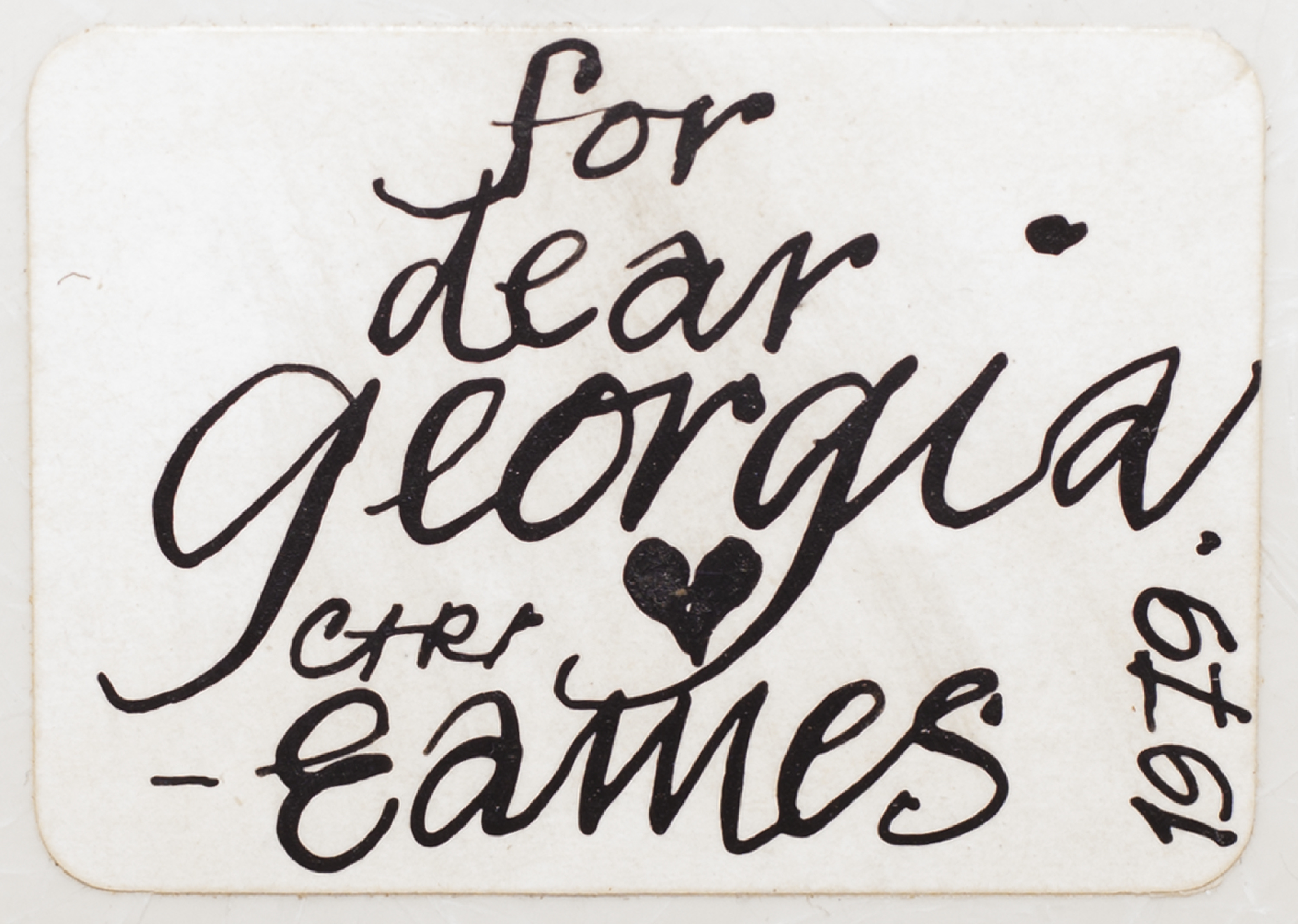 A note using cursive writing that says: 'for dear georgia [heart shape] c+r -eames 1979'.