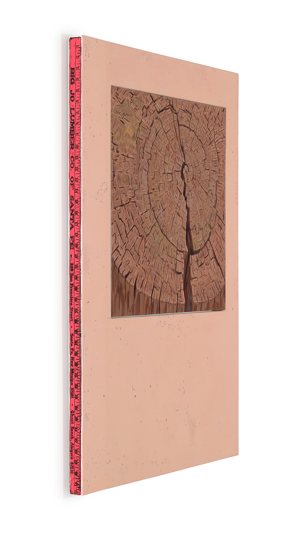 This is an image that shows the side view of O'Keeffe's Tree Stump showing a screen printed ruler painted along the edge of the painting with a pink background and black numbers.